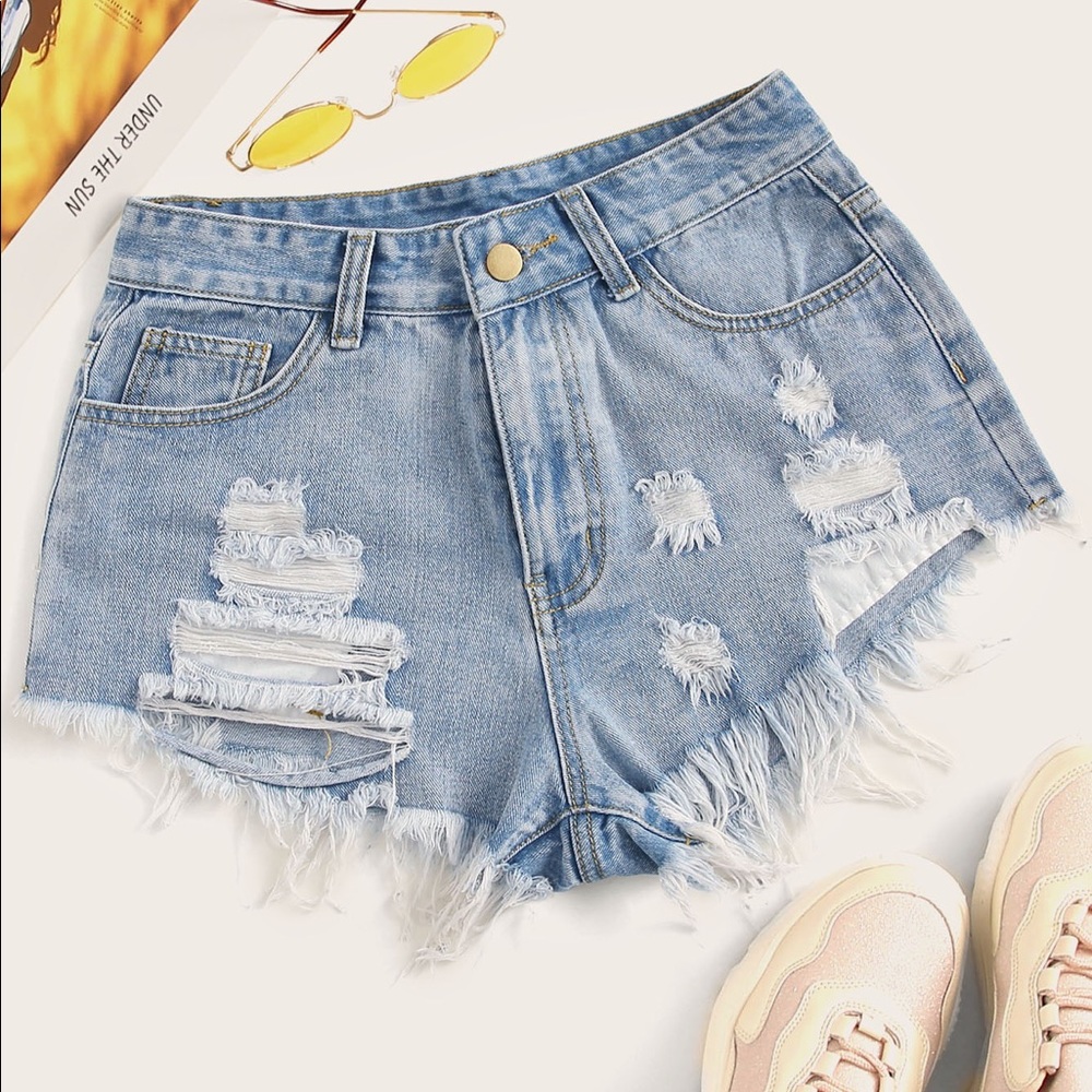 Light blue distressed shorts